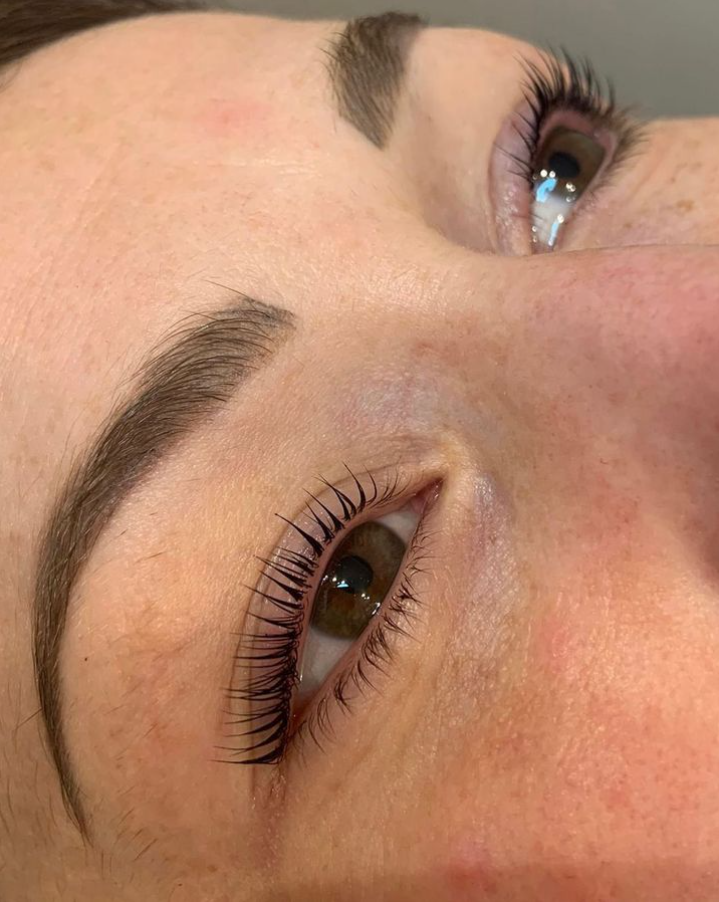 A lash lift and shaped brows, close up